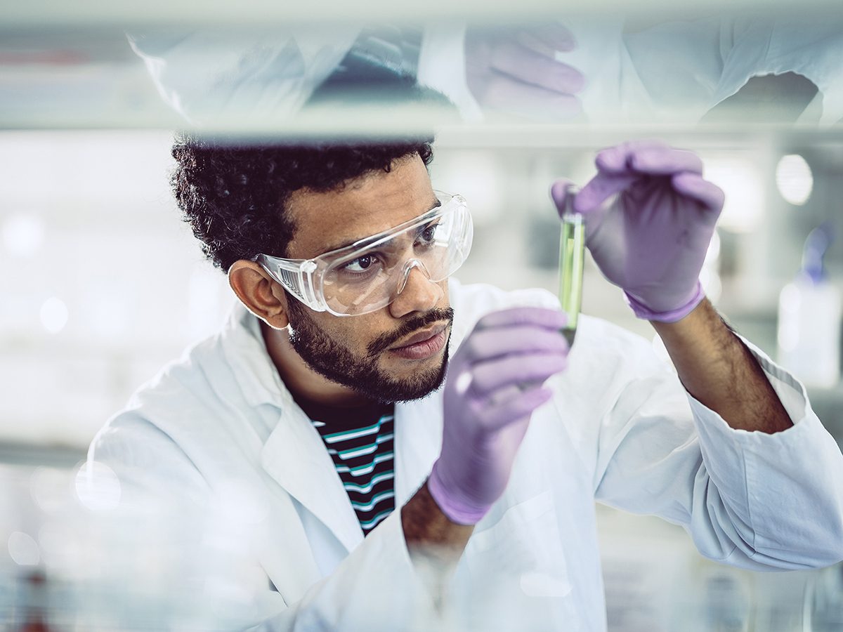 Scientist Looking at Test Tube