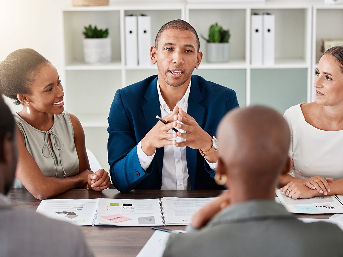 Leadership, ceo or b2b with teamwork, collaboration and planning with meeting for vision and mission for company. Business meeting with conversation in office for strategy, growth and development
