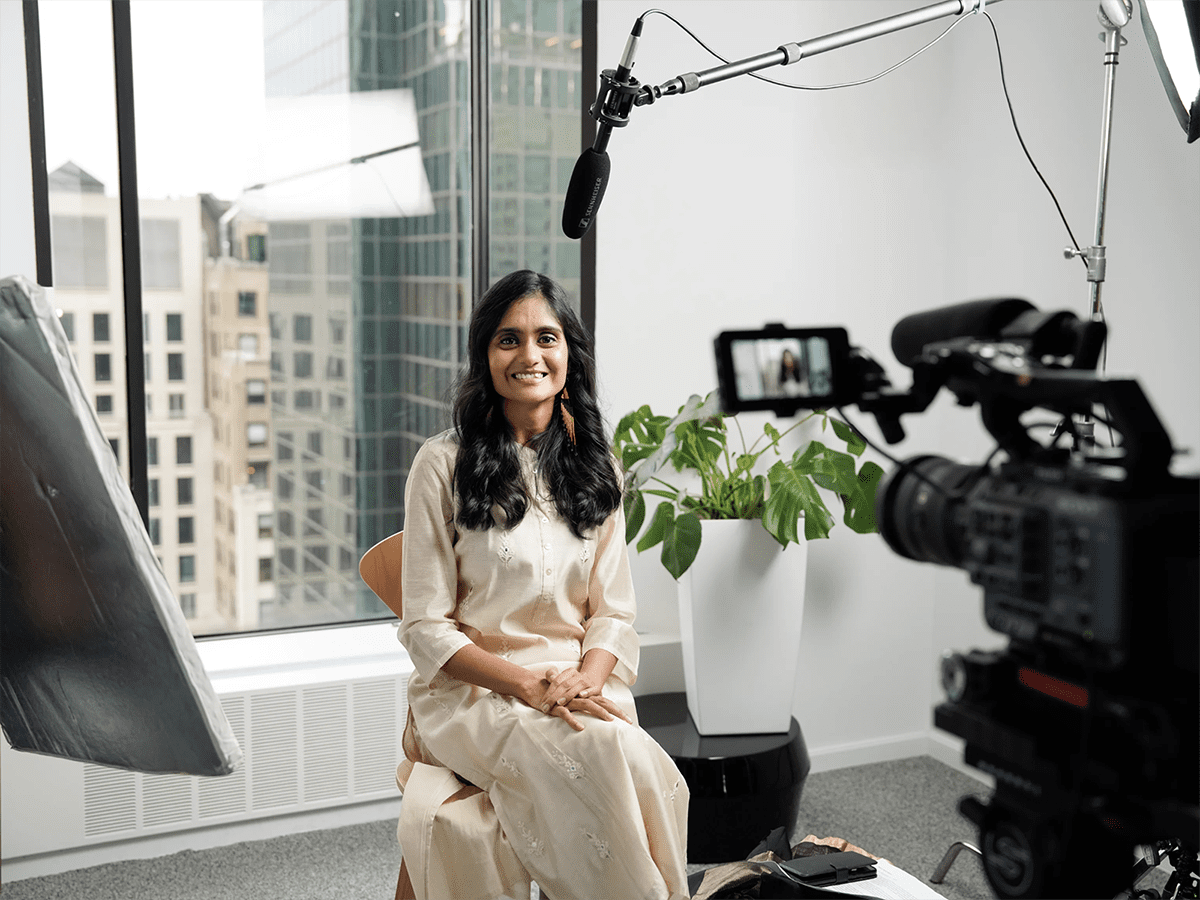 Setting up to film Asian professional woman.